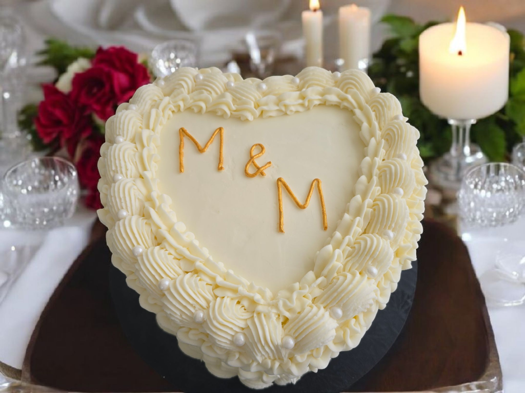 Heart shaped anniversary cake with initials