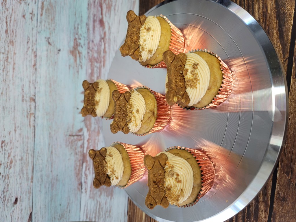 Peanut butter cupcakes with dog bone cookies